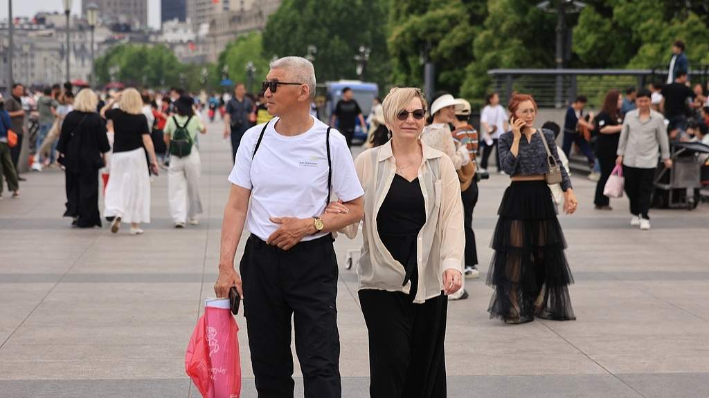 “中国游”“中国购”圈粉境外旅客